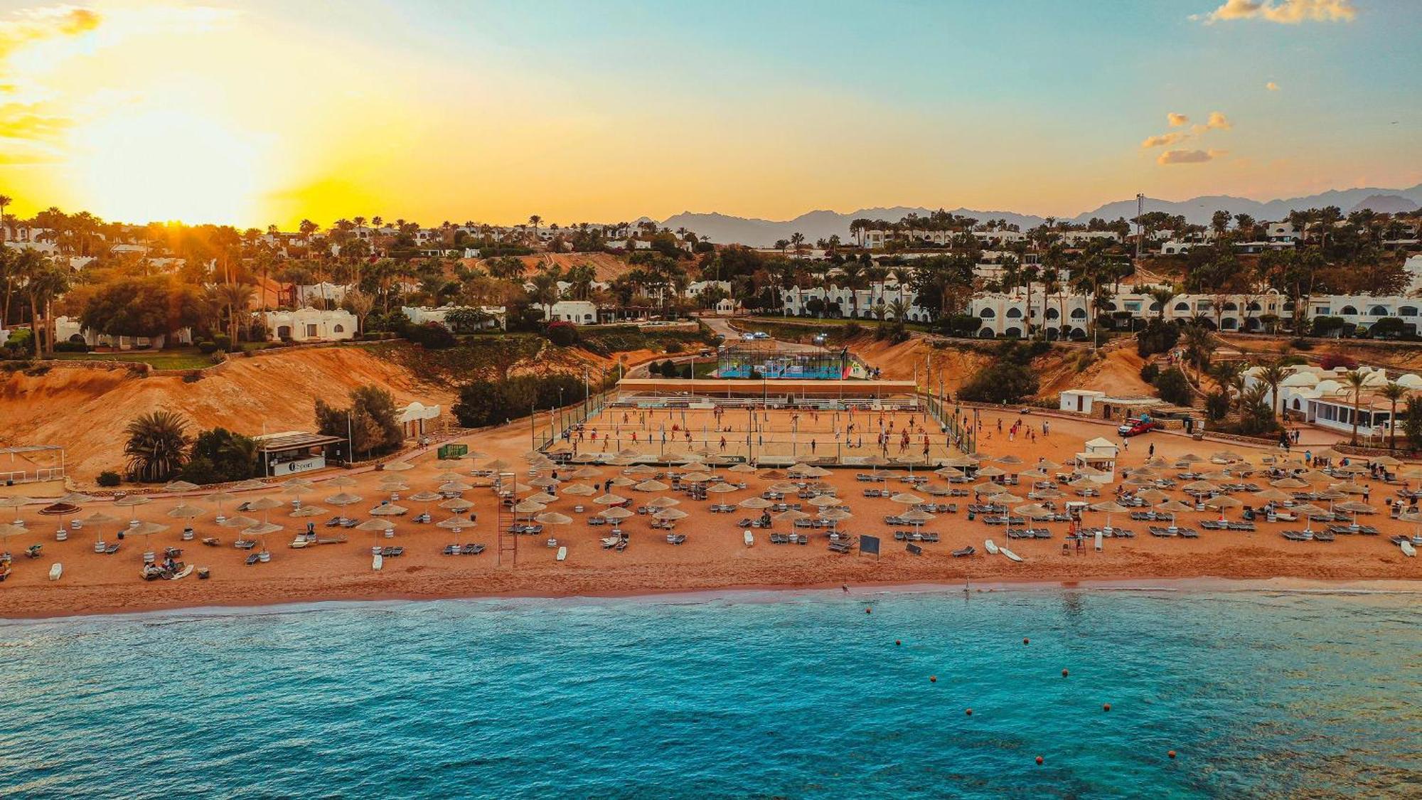 Domina Coral Bay Resort, Diving , Spa & Casino Sharm el-Sheik Eksteriør bilde Sunset at the beach